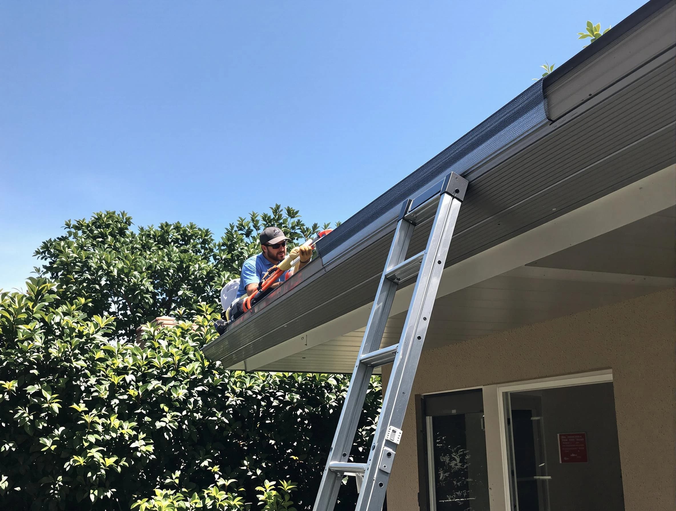 New Franklin Roofing Company installing gutter guards for a homeowner in New Franklin, OH