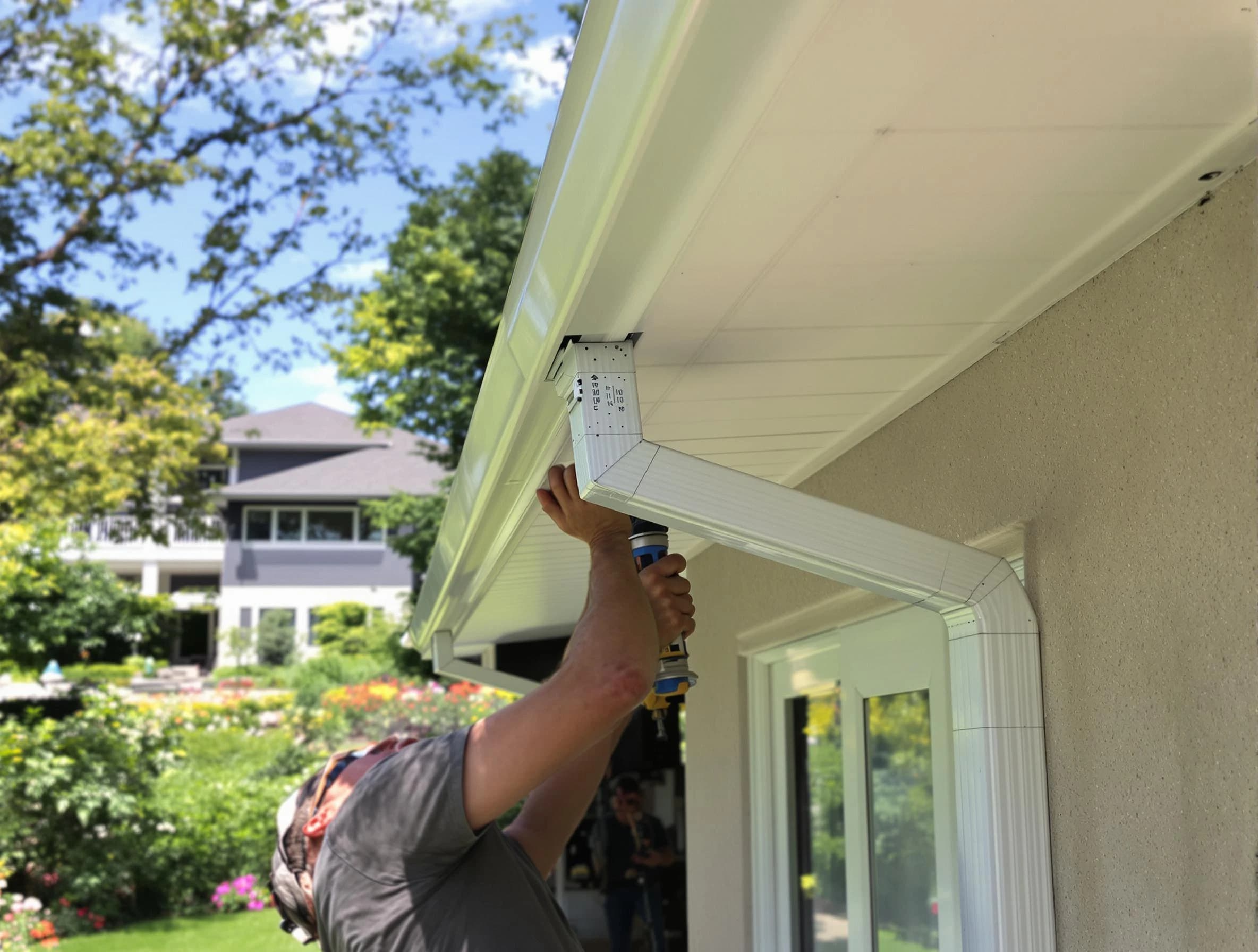 New Franklin Roofing Company technicians performing gutter installation in New Franklin, OH