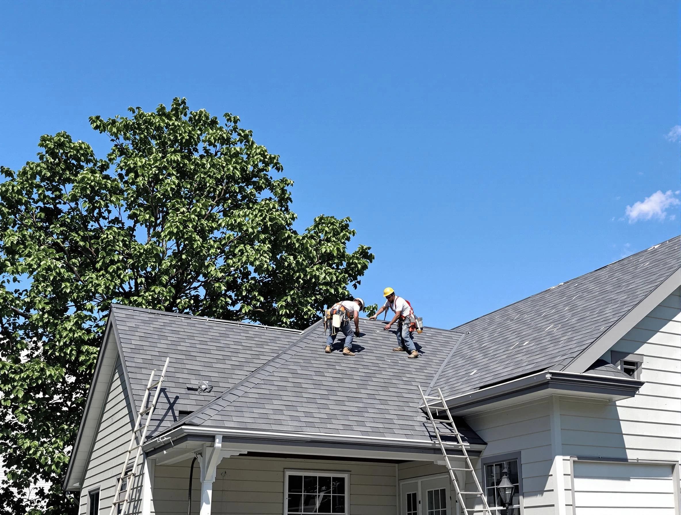 New Franklin Roofing Company crew finalizing a roof installation in New Franklin, OH